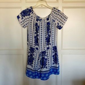 Women’s barely worn blue and white romper with tie waist. Women’s size S